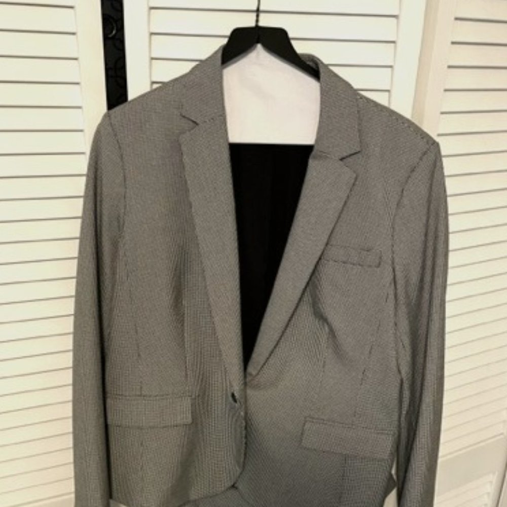 2 piece houndstooth pant suit.